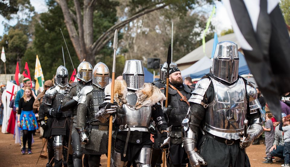 Knights dressed up in armour marching